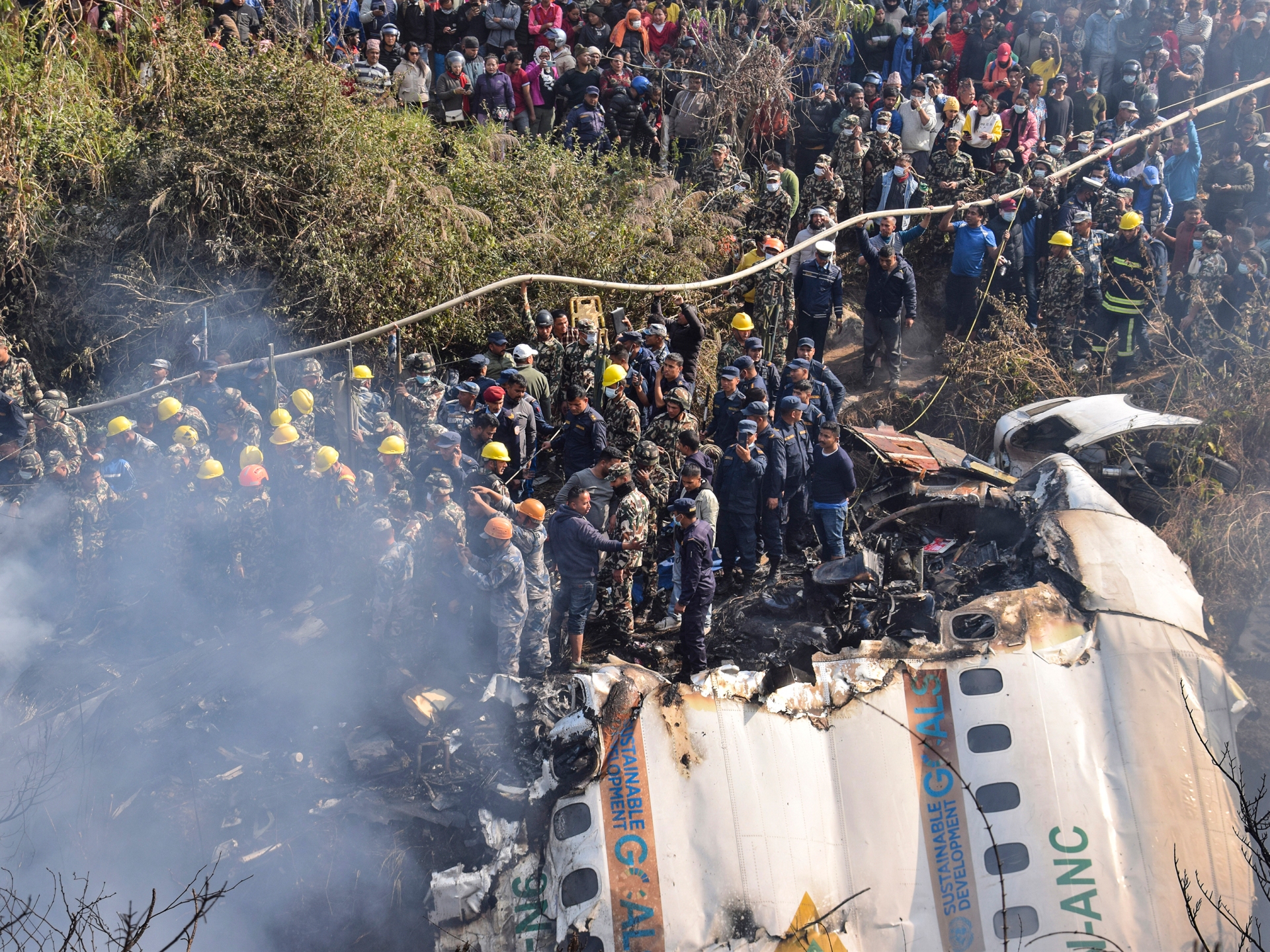 grim-task-of-identifying-the-dead-begins-after-nepal-plane-crash